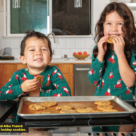 Kids volunteer at the holidays by making and donating cookies.